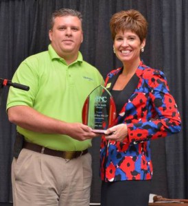 Denise is presented with the coveted 2013 Patsy B. Smith award by John Sneed on behalf of the Association Executives of North Carolina